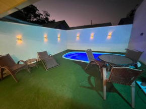Geminado com piscina
